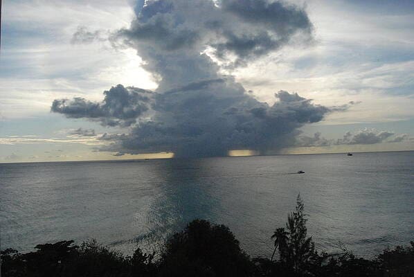 A large cloud formation over the ocean.